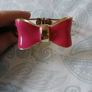 Pink and gold bow bracelet